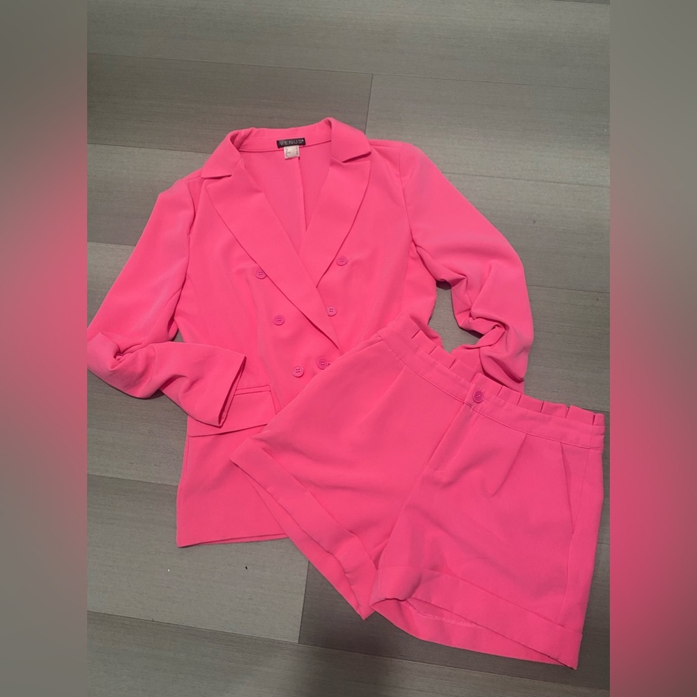 Pink shorts and jacket.